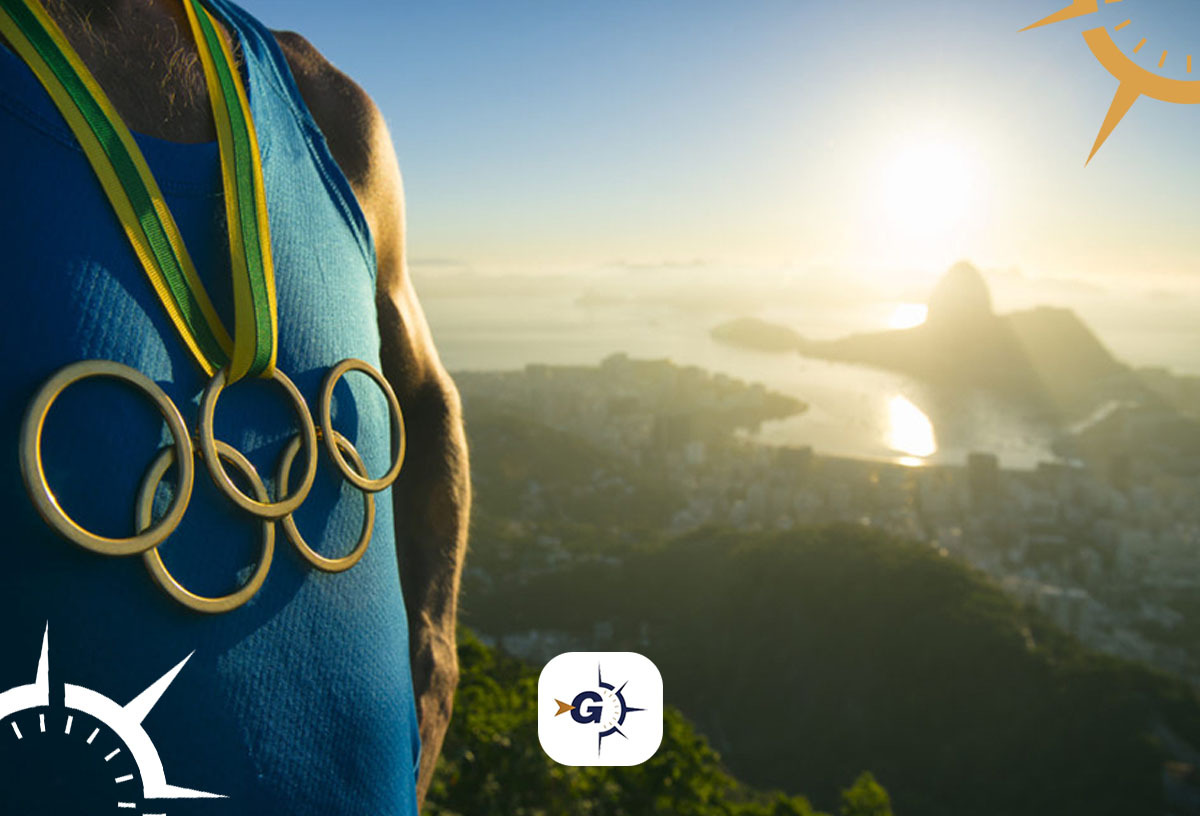 Atleta brasileiro usando medalhas olímpicas com o Rio de Janeiro como plano de fundo